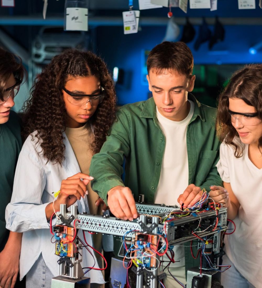 group-young-people-doing-experiments-robotics-laboratory-girls-protective-glasses